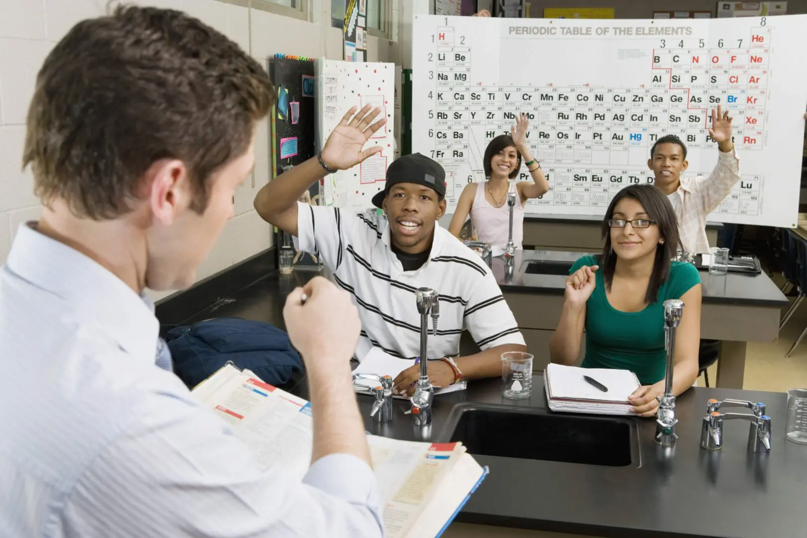 A teacher with four students