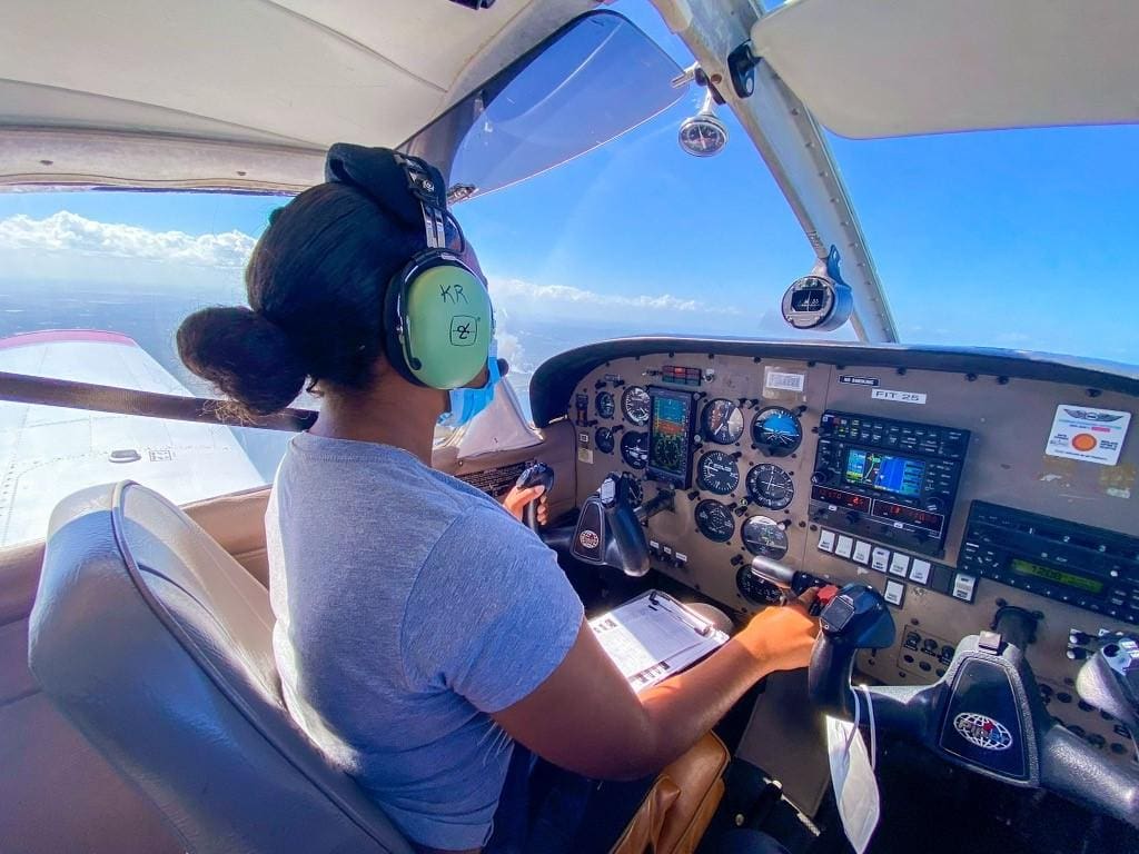 Female Pilot in Cockpit