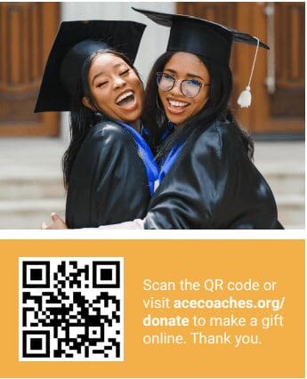 Two graduates in caps and gowns smiling happily together.