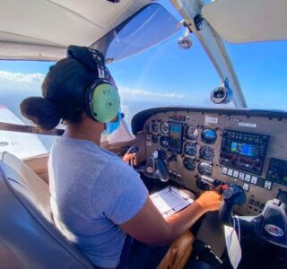 Female Pilot in Cockpit