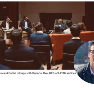 Panel discussion with executives at an aviation event.